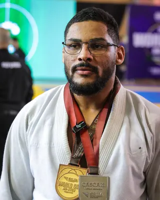 An Under Pressure athlete with two medals